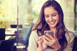 Woman Looking At Phone