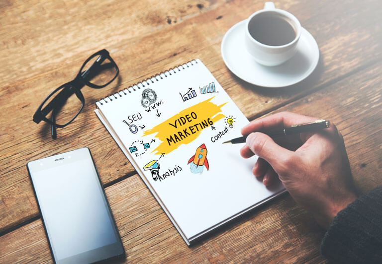 Man Writting Video Marketing Text